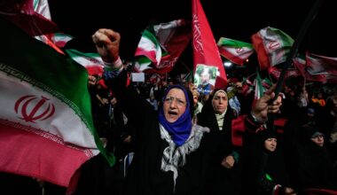 A pro-government demonstrator chants slogan during a gathering in a square in Tehran, on Aug. 26.