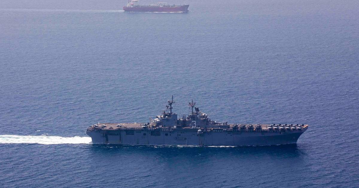 US imposes new Iran sanctions as officials say Hormuz deal is near