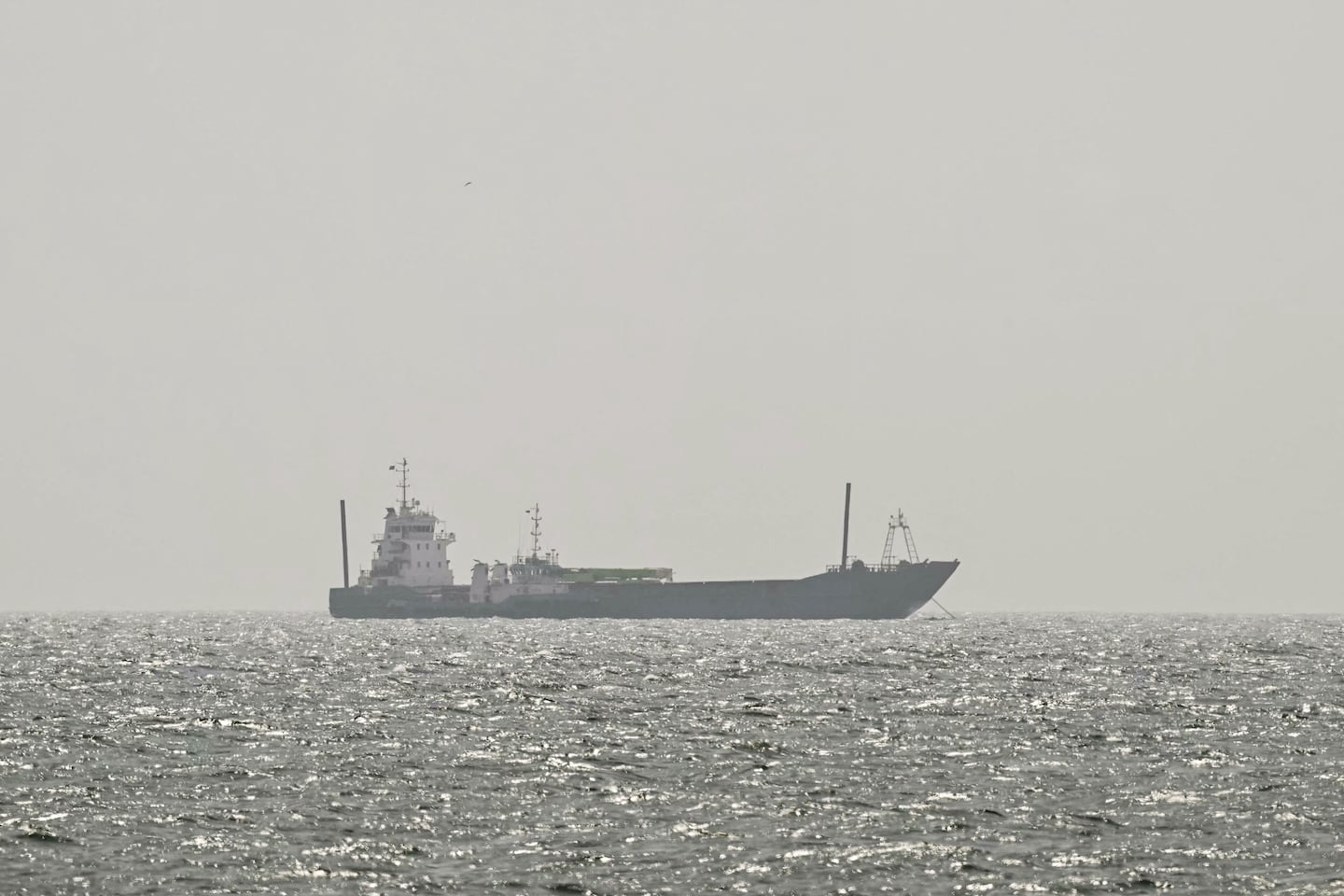 A vessel is anchored off the coast of Sharjah in the United Arab Emirates on August 3, 2026.