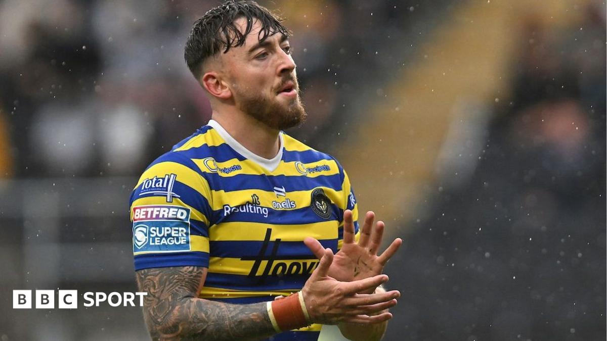 Warrington Wolves wing Matt Ashton applauds the club's travelling fans after their win at Hull FC