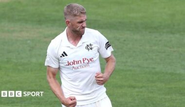 Olly Stone clenches his fists in celebration