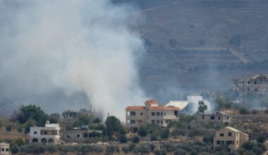 A photograph taken from the southern Lebanese village of Qabrikha shows smoke rising from burning fields in the and destroyed houses in the village of Bani Hayyan, during earlier Israeli military operations and now under it's control, some 10 kilometres from the Lebanon-Israel border on Aug. 14, 2026. Lebanon became embroiled in the Middle East war after Hezbollah fired rockets at Israel on March 2, prompting a widespread Israeli bombing campaign and ground invasion. More than 4,300 people have been killed, though violence has decreased since a US-Iran deal and a Washington-sponsored framework agreement between Lebanon and Israel went into force.