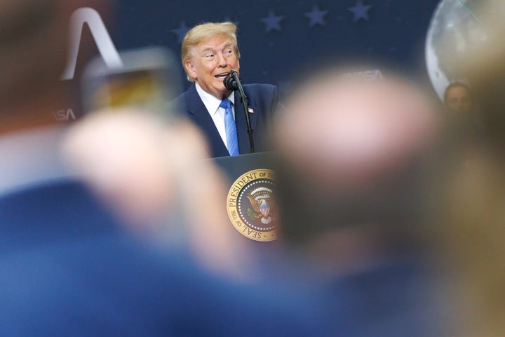 President Donald Trump speaks at the NASA Johnson Space Center in Houston, Texas, on Friday. 