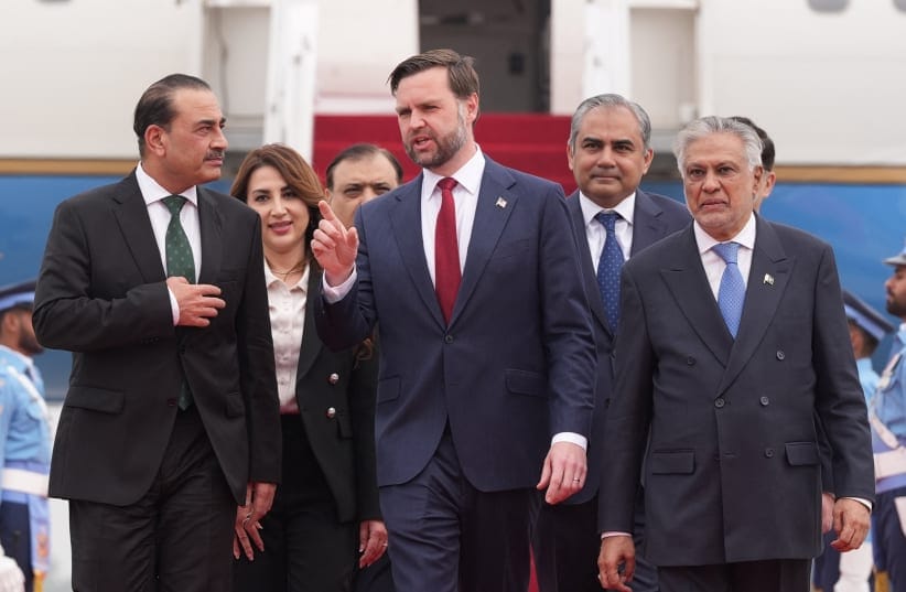 US Vice President JD Vance walks with Pakistan's Chief of Defence Forces and Chief of Army Staff Field Marshal Asim Munir and Pakistani Deputy Prime Minister Mohammad Ishaq Dar after arriving for talks with Iranian officials in Islamabad, Pakistan, Saturday, April 11, 2026.
