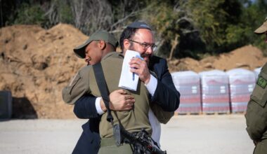 Rabbi Efraim Dochman of Colel Chabad embraces an IDF soldier during a visit to support troops serving on the front lines.