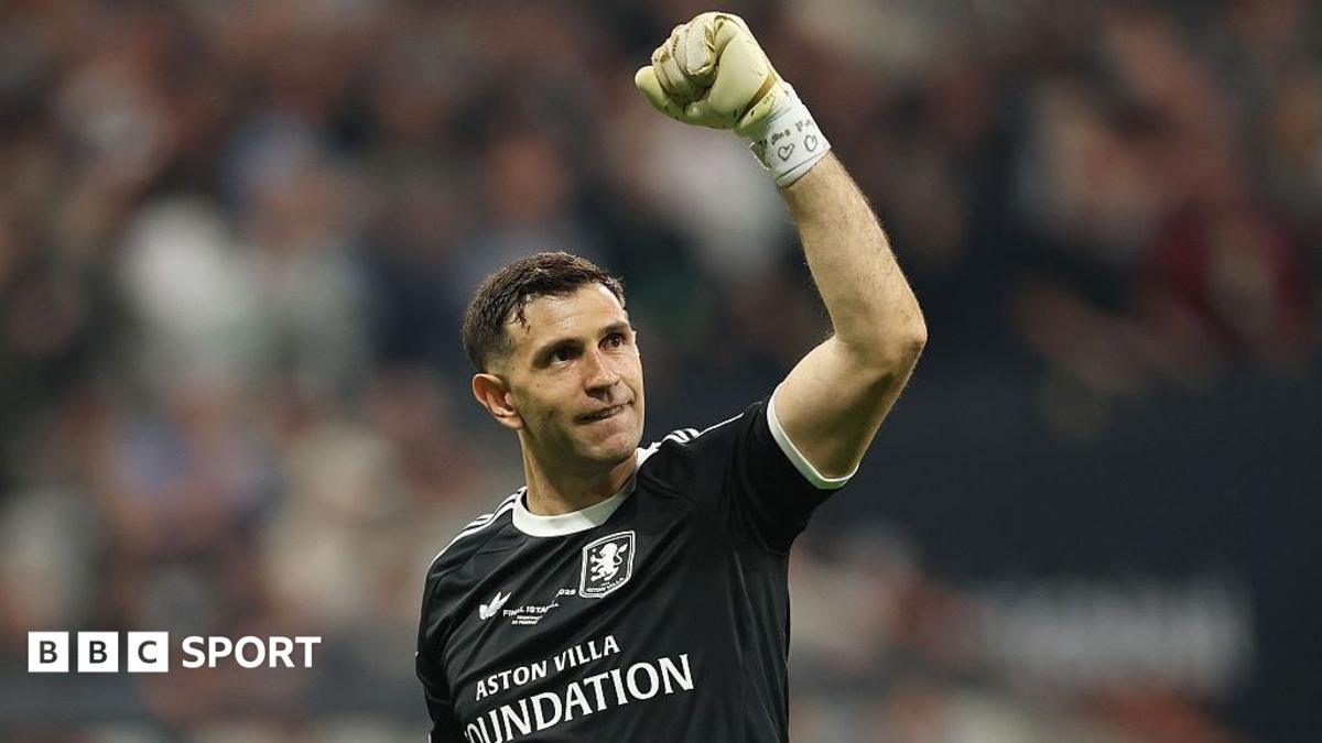 Emiliano Martinez punches the air