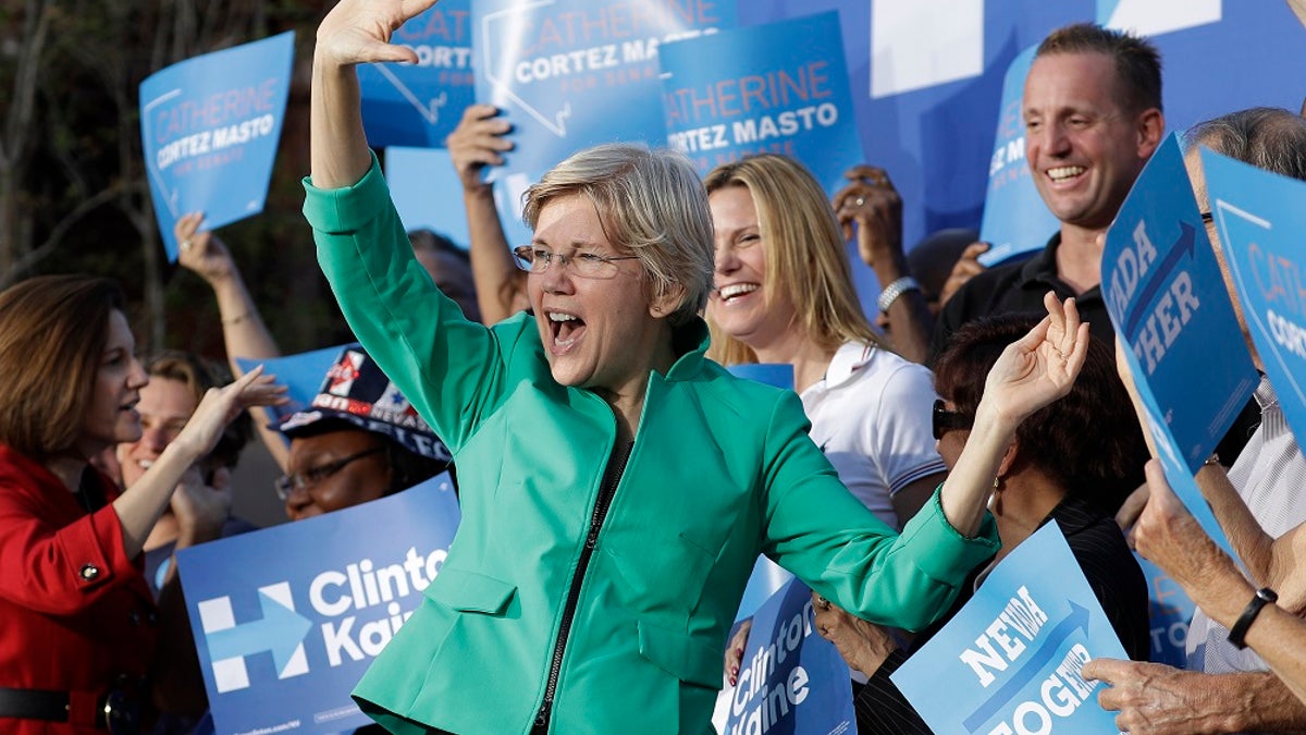 FILE - Sen. Elizabeth Warren, D-Mass., was briefly heckled during a campaign rally in Georgia over her Native American ancestry claims. (AP Photo/John Locher, File)