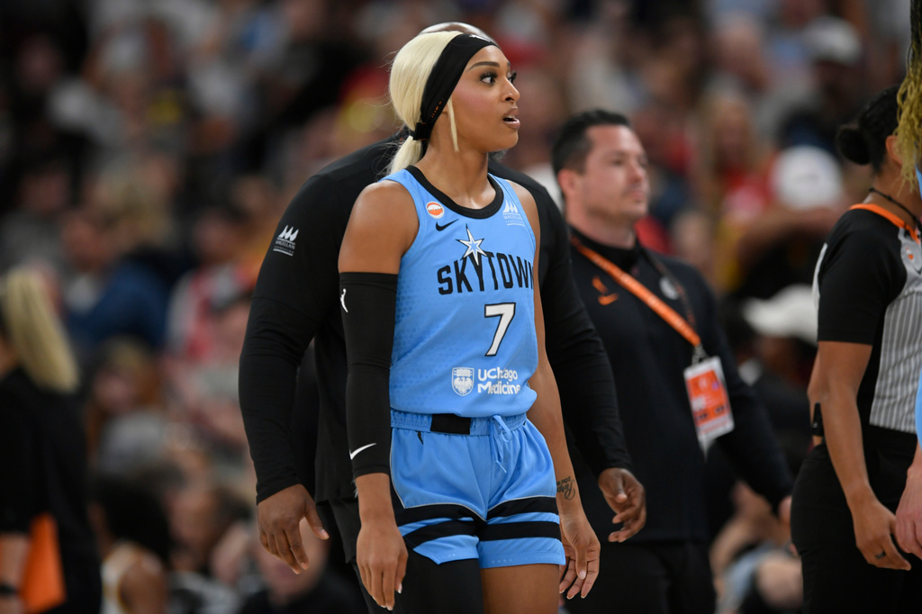 Chicago Sky's DiJonai Carrington walks off the court ejected from the game for committing a flagrant foul against Indiana Fever's Sophie Cunningham during the first half of an WNBA basketball game in Chicago, Saturday, Aug. 8, 2026. (AP Photo/Paul Beaty)
