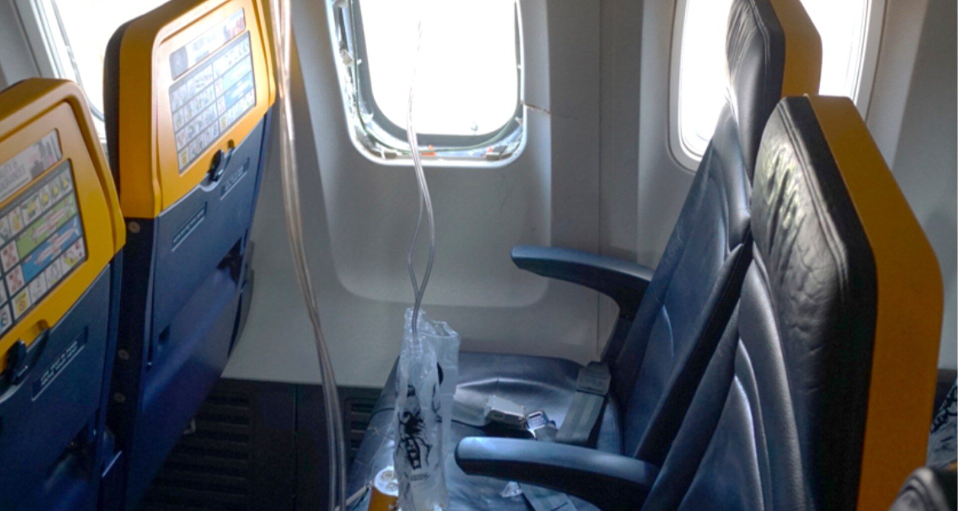 Engine debris shattered Ryanair window, pulling passenger out, NTSB says | News