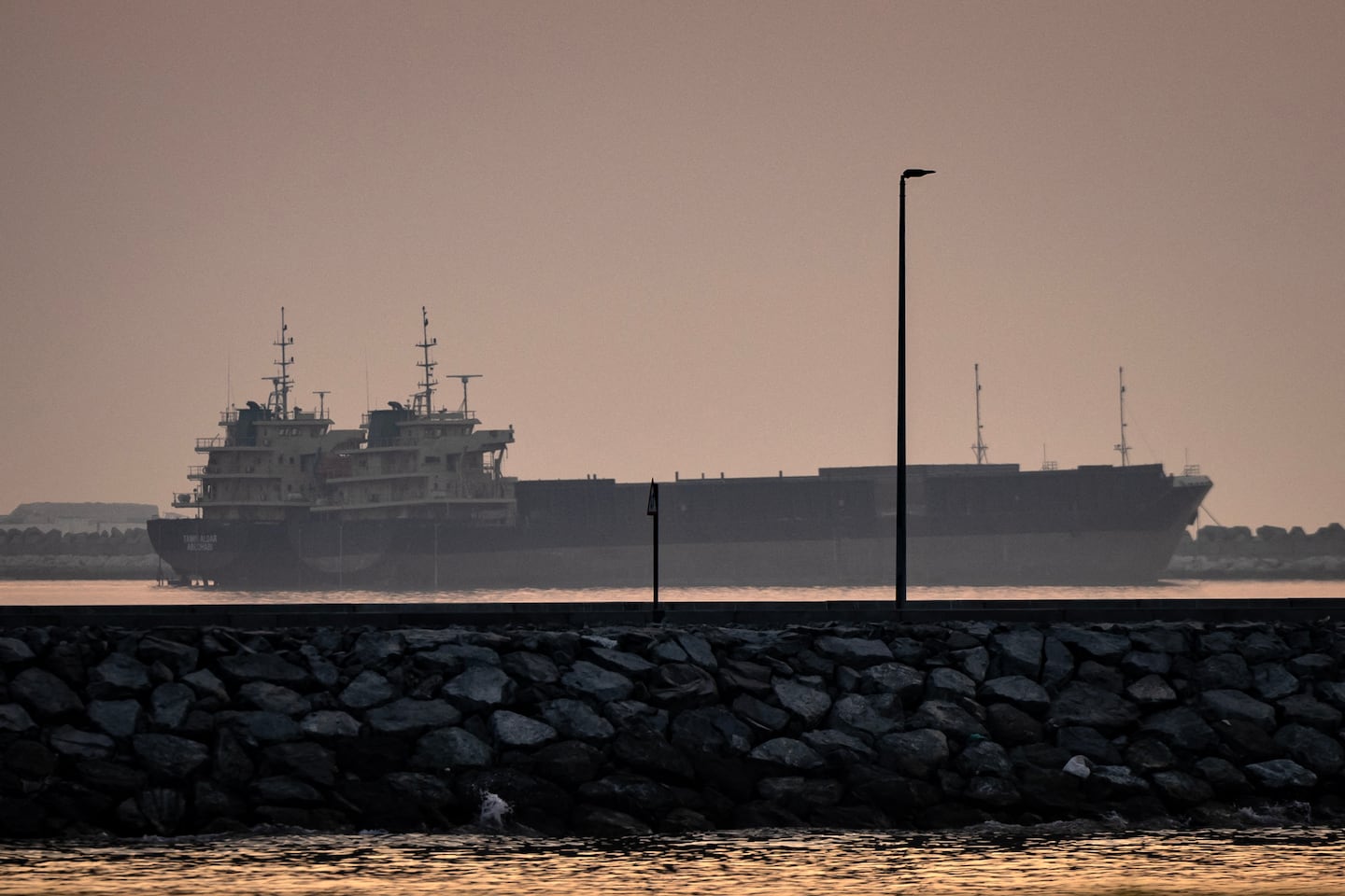 Two ships are anchored off Dubai on July 31, 2026. The war, which erupted at the end of February 2026, resumed in July after a ceasefire that had lasted just a few weeks, throwing the region back into chaos as Iran and the United States battle for control of the Strait of Hormuz water way.
