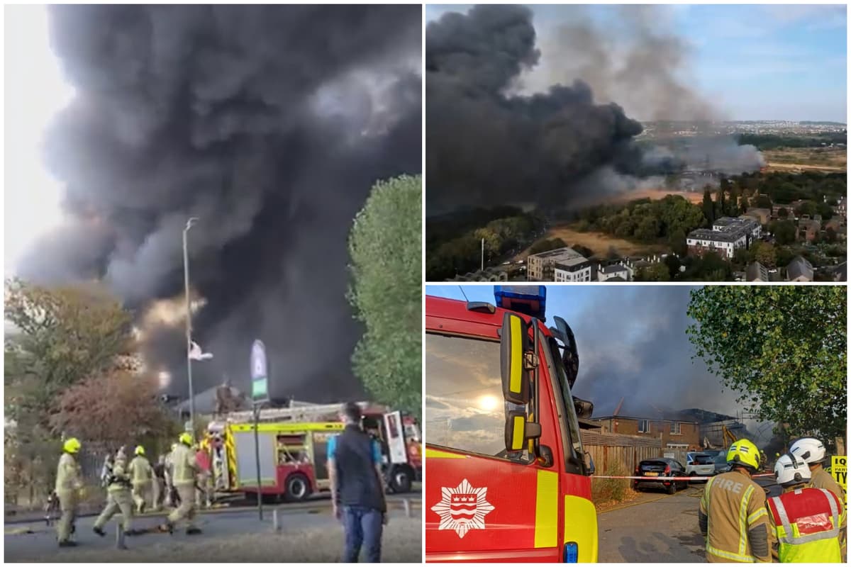 Mitcham fire: 125 firefighters battle huge blaze in south London as smoke billows across sky