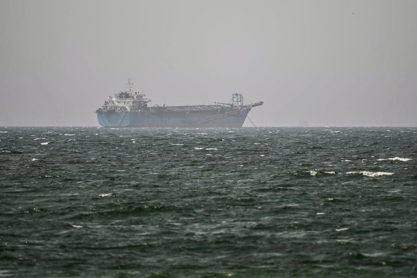 A vessel is anchored off the coast of Sharjah in the United Arab Emirates on Aug. 3, 2026. Iran's foreign ministry said on Aug. 3 there were currently no negotiations with the United States but talks were taking place with Oman on management of the strategic Strait of Hormuz. Iran has kept control of Hormuz since the outbreak of the war in the Middle East on Feb. 28.