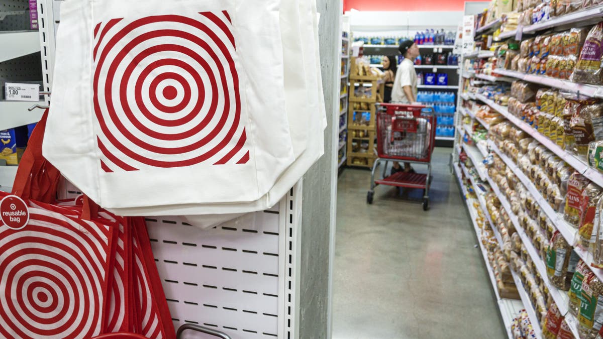 Miami Beach, Florida, Target discount department store, red dot logo, reusable shopping bags sustainability and person shopping