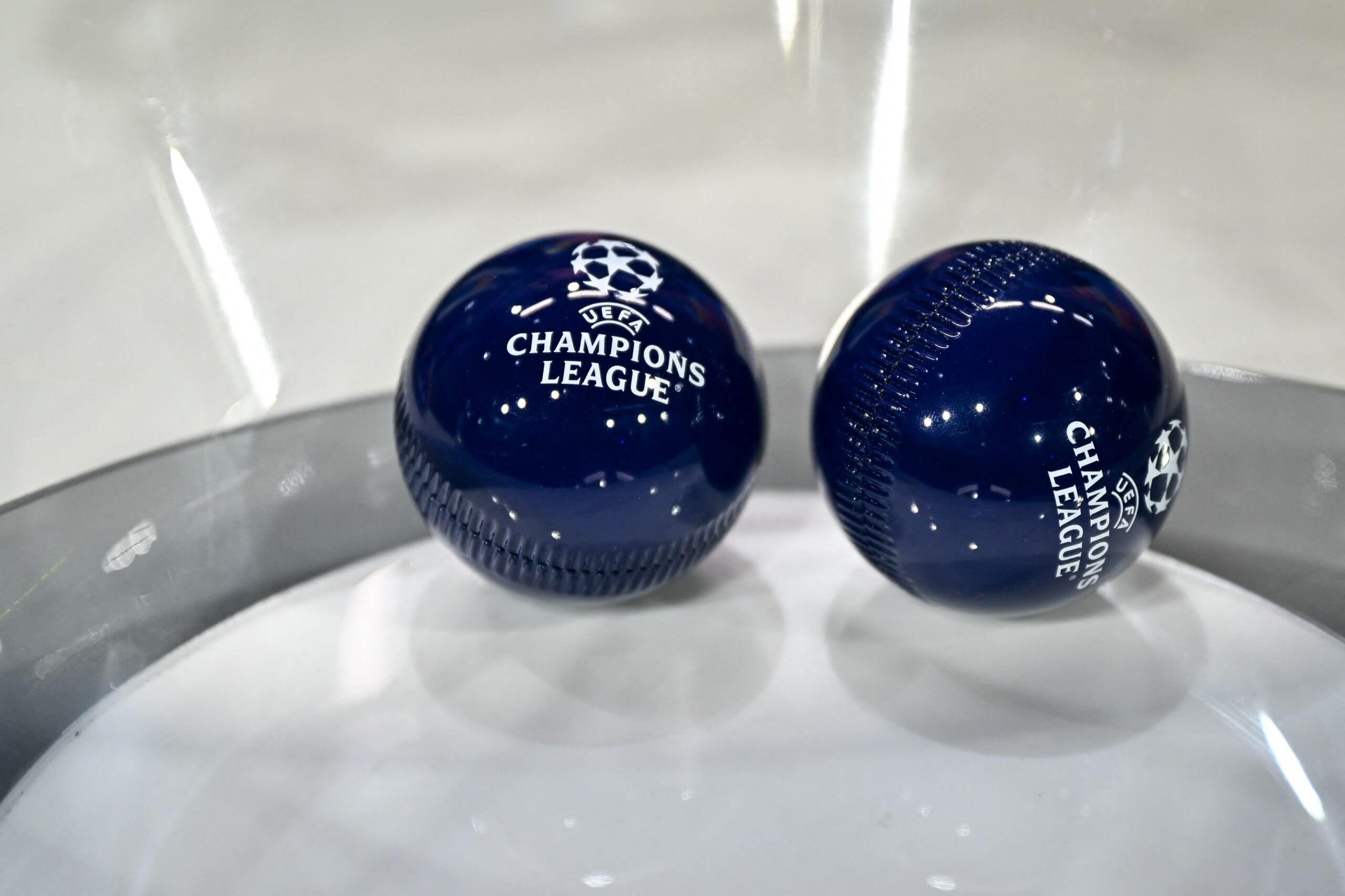 A close-up image of two Champions League draw balls