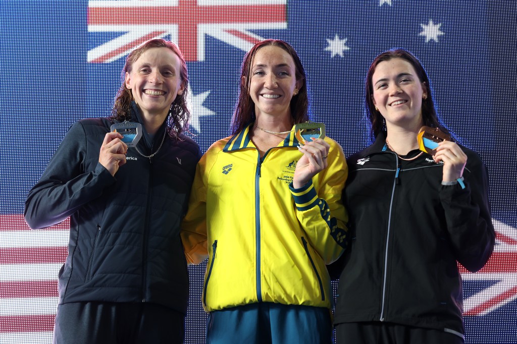 (L-R) Katie Ledeky of Team United States second place, Lani Pallister of Team Australia first place and Erika Fairweather of Team New Zealand look on from the podium for the Women's 800m Freestyle Final on Day 4 of the Pan Pacific Swimming Championships at William Woollett, Jr. Aquatics Center on August 15, 2026 in Irvine, California.