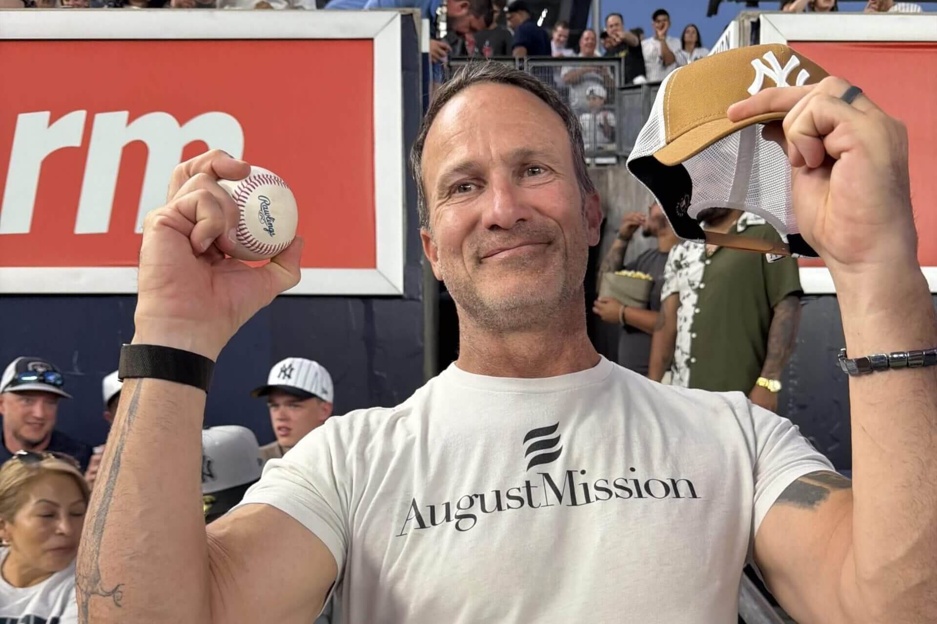 Bruce Roberts holds his home run ball.