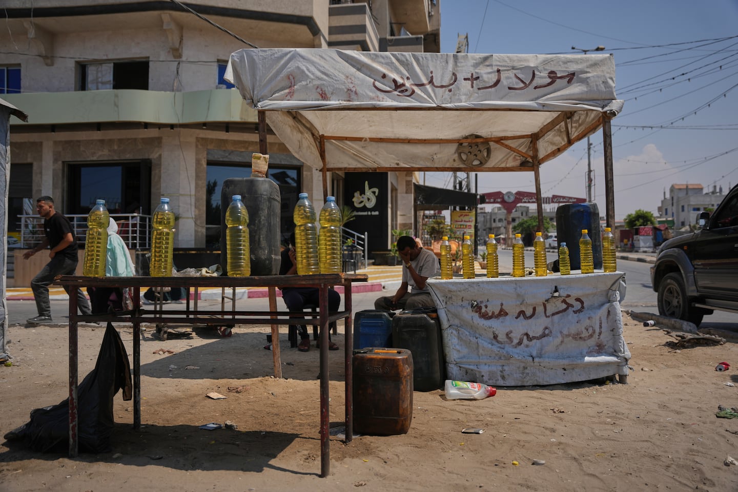 A Palestinian vendor offered bottles of diesel for sale in al-Maghazi refugee camp, central Gaza Strip, on Saturday.