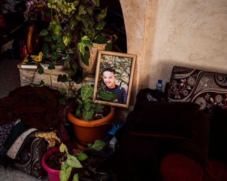 A picture of Mohammed Abu Khdeir in the living room of his home, in Shuafat neighbourhood of Occupied East Jerusalem. Mohammed was kidnapped outside his home and murdered by Israeli Jewish citizens on July 2nd 2014 [Lucien Lung/Al Jazeera]