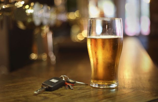 File photo dated 26/11/14 of a pint of beer and a set of car keys on a bar in a pub in central London. More than a fifth (21%) of motorists have drunk alcohol after 10pm when needing to drive before 9am the following morning, a new survey suggests. Road safety charity IAM RoadSmart, which commissioned the poll, warned that drinking alcohol the night before getting behind the wheel can pose a 