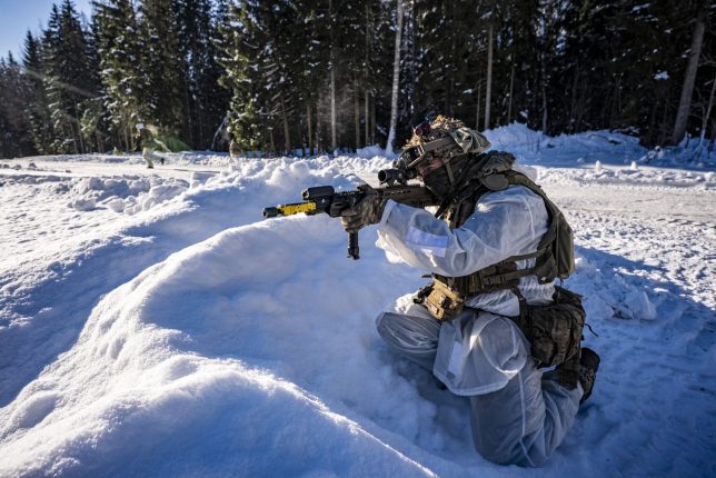 A soldier from the 2nd Battalion The Royal Anglian Regiment (The Poachers) engages enemy troops on the Tapa range in Estonia where British soldiers are taking part in Exercise Winter Camp, which is part of Operation Cabrit, the UK's contribution to Nato's Forward Land Forces in Estonia and Poland. Picture date: Tuesday February 3, 2026. PA Photo. Photo credit should read: Ben Birchall/PA Wire