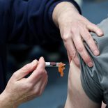 Natalie Allgrove, of the Kent Community Health NHS Trust immunisation team, administers a Meningitis B vaccination to student May Croxton, at a sports centre on the University of Kent campus, following an outbreak of meningitis cases in Kent, in Canterbury, Britain, March 20, 2026. REUTERS/Toby Melville