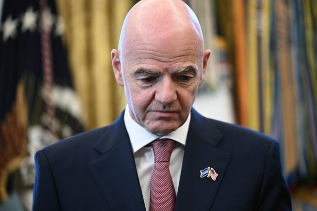 (FILES) FIFA president Gianni Infantino looks on during a meeting with the White House Task Force on the FIFA World Cup 2026 in the Oval Office of the White House in Washington, DC on November 17, 2025. FIFA president Gianni Infantino has lost the "confidence" of the UEFA, European football's governing body, it said in a statement on August 1, 2026, after his plan to allow private investment in the World Cup was withdrawn following a global backlash. (Photo by Brendan SMIALOWSKI / AFP via Getty Images)