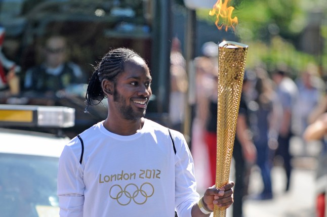 File photo dated 23/7/12 of Torchbearer 132 Jason Arday carries the Olympic Flame on the Torch Relay leg between Sutton (London Borough) and Merton (London Borough). Professor Jason Arday, a professor of sociology of education who became Cambridge?s youngest black professor in 2023, resigned from his post on Wednesday evening after the university launched an inquiry into his 