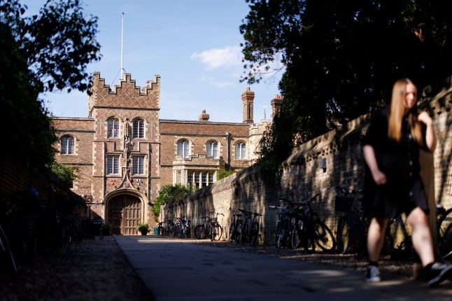 epa13155807 People walk outside Jesus College, where the resigned Professor Jason Arday worked, at the University of Cambridge in Cambridge, Britain, 07 August 2026. Professor of Sociology of Education Jason Arday resigned from the University of Cambridge and Jesus College on 05 August amid plagiarism allegations and scrutiny of claims about his academic history, shortly after Cambridge announced an investigation into new information concerning his academic qualifications and honorary appointments. EPA/TOLGA AKMEN