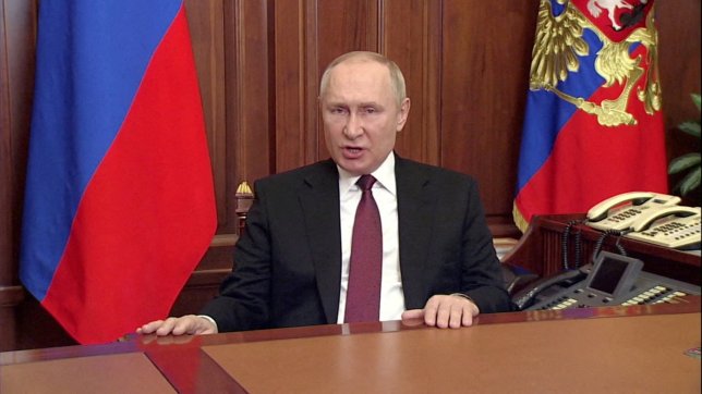 FILE PHOTO: Russian President Vladimir Putin speaks about authorising a special military operation in Ukraine's Donbass region during a special televised address on Russian state TV, in Moscow, Russia, February 24, 2022, in this still image taken from video. Russian Pool/via REUTERS TV TPX IMAGES OF THE DAY/File Photo