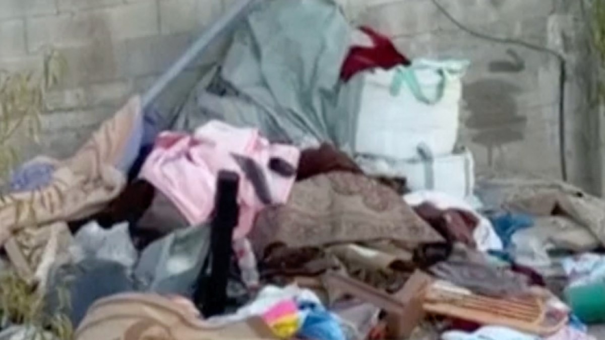 Israeli soldiers throw belongings from besieged Palestinian home | Occupied West Bank