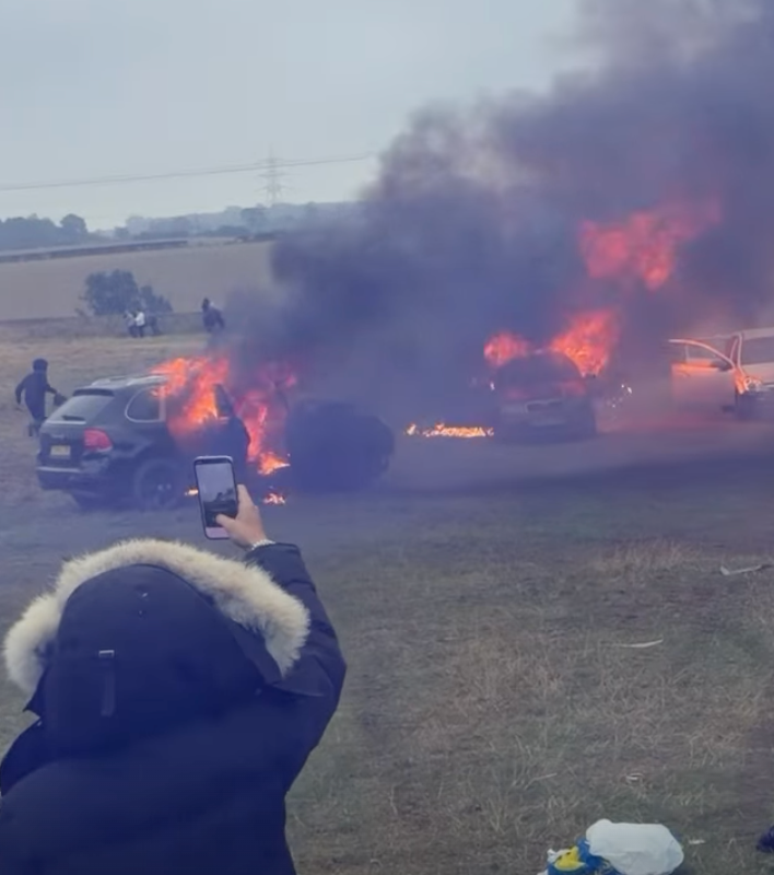 Cars are torched at a vigil for one of the young men killed in Middlesbrough