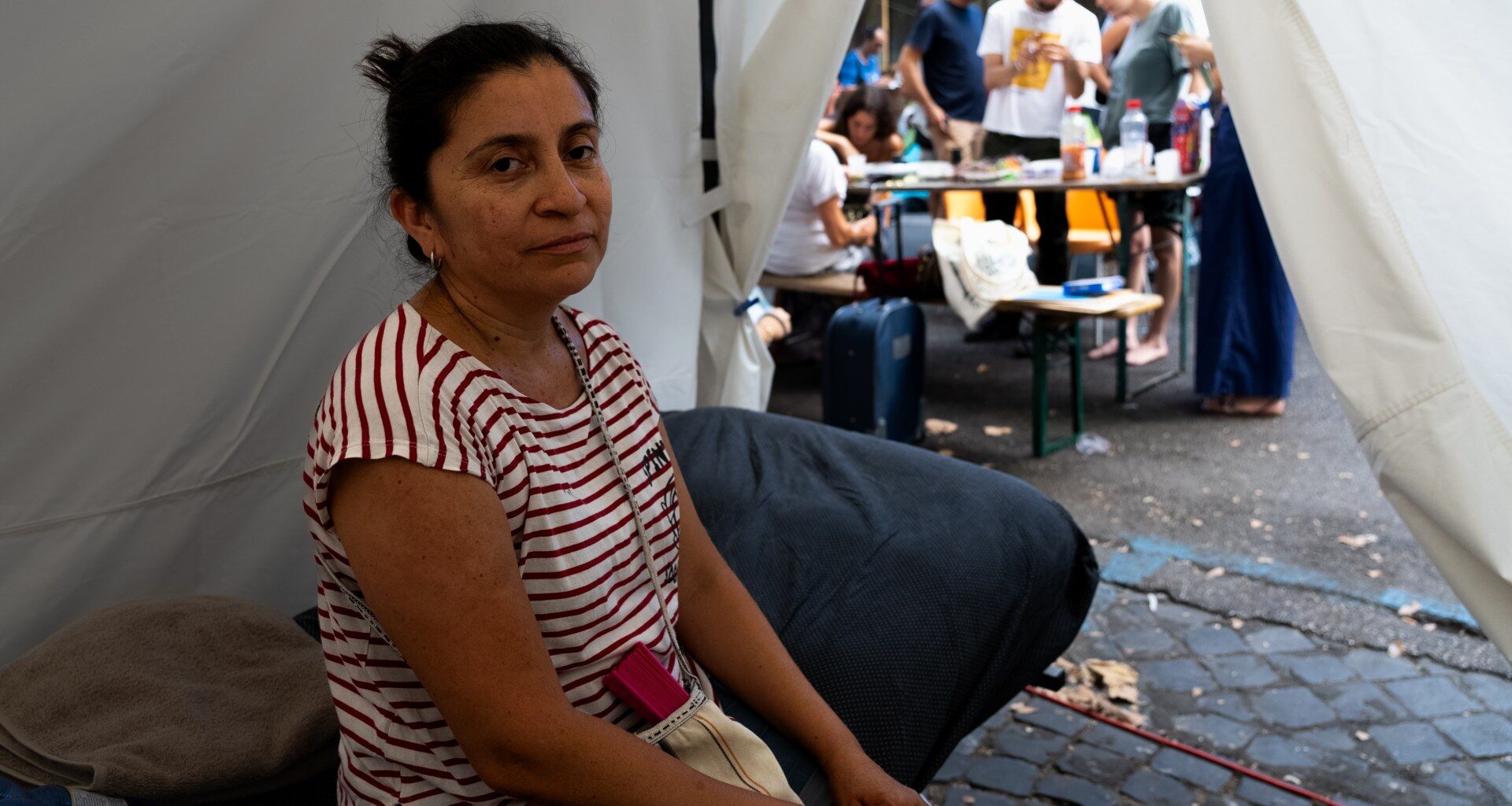 Hundreds camp on sweltering Rome street amid tussle over squatted building | Housing News