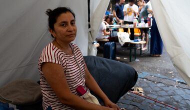 Hundreds camp on sweltering Rome street amid tussle over squatted building | Housing News
