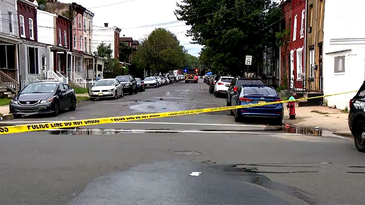 police on scene of shooting in daytime