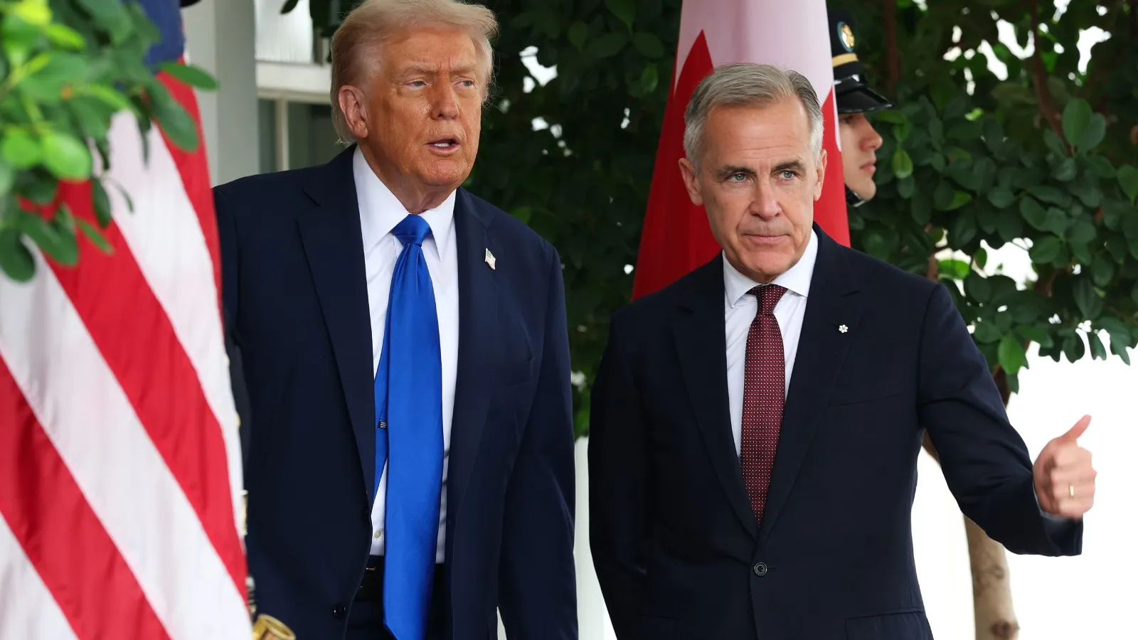U.S. President Donald Trump (L) welcomes Canadian Prime Minister Mark Carney outside the West Wing of the White House on October 07, 2025 in Washington, DC.