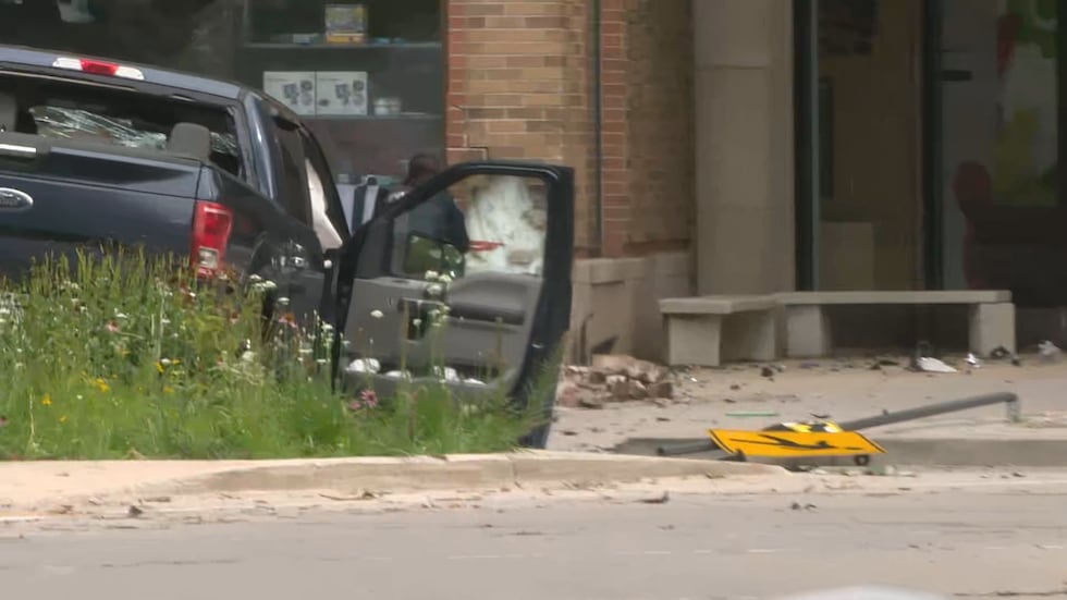 A fire official said a pickup truck injured five pedestrians and crashed into the corner of...