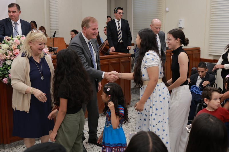 Elder Gary E. Stevenson of the Quorum of the Twelve Apostles and his wife, Sister Lesa Stevenson, greet Latter-day Saints in Cali, Colombia, on Monday, Aug. 24, 2026.