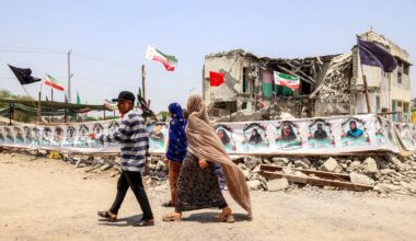 People walked near the building of the destroyed Shajareh Tayyebeh primary school in Minab, in Iran's Hormozgan province, on Monday.