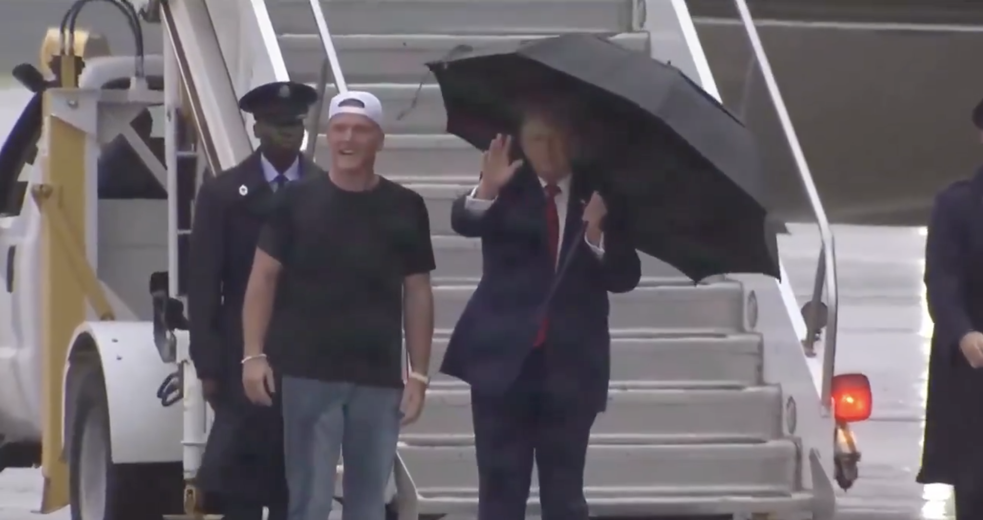 Pat McAfee greets Donald Trump on tarmac in Cleveland for Patriot Games