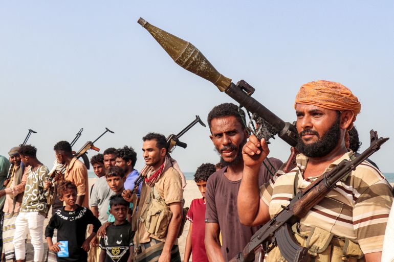 Fighters supporting the Aden-based internationally recognised Yemeni government gather during a vigil along the Red Sea shore in Khokha, in Yemen’s western Hodeidah province, on July 20, 2026. They called for a resumption of hostilities with the Houthi group currently controlling the capital, Sanaa [AFP]