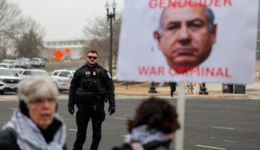 Anti-Trump and pro-Palestine protesters gather outside the Donald J. Trump Institute of Peace in Washington, DC on Feb. 19, 2026. (AFP Photo)