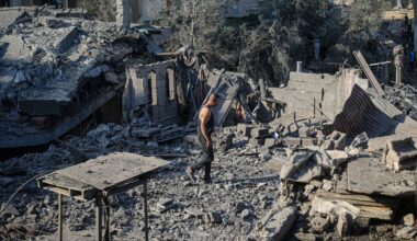 Displaced Man Walks Through Rubble In Deir Al-Balah