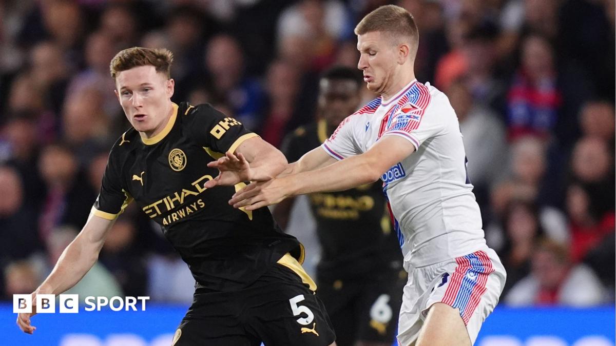 England midfielders Elliot Anderson and Andy Wharton contest possession in the Premier League game between Manchester City and Crystal Palace at Selhurst Park.