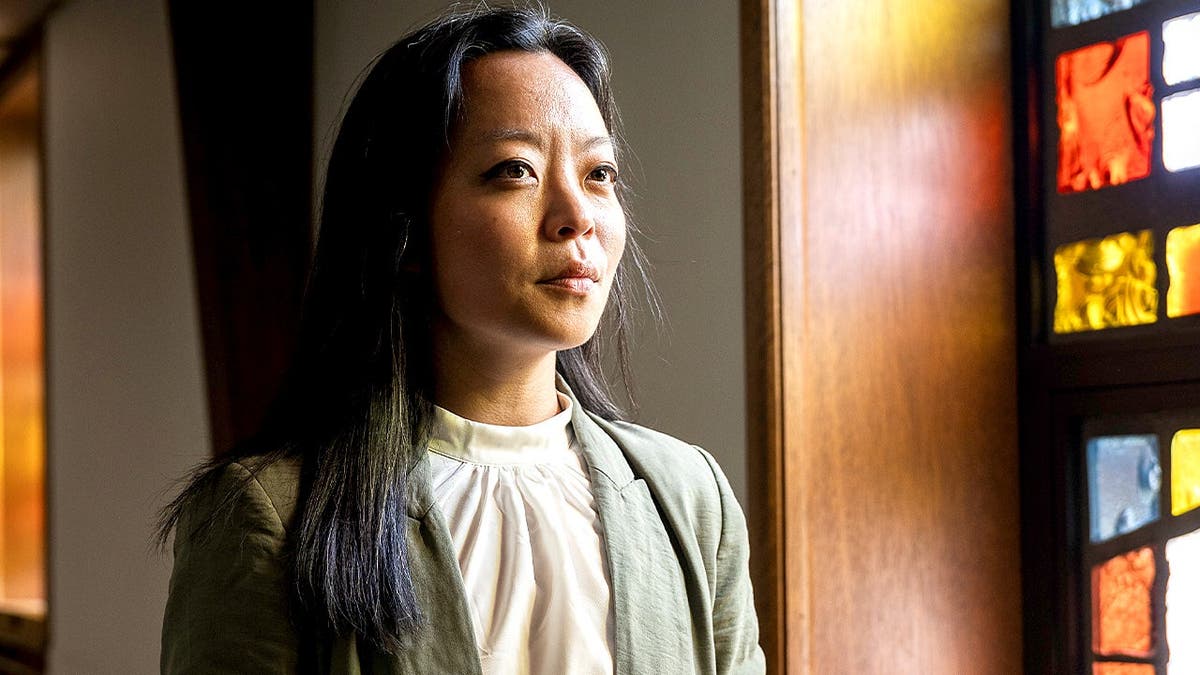 Francesca Hong poses for portrait at Wisconsin church.