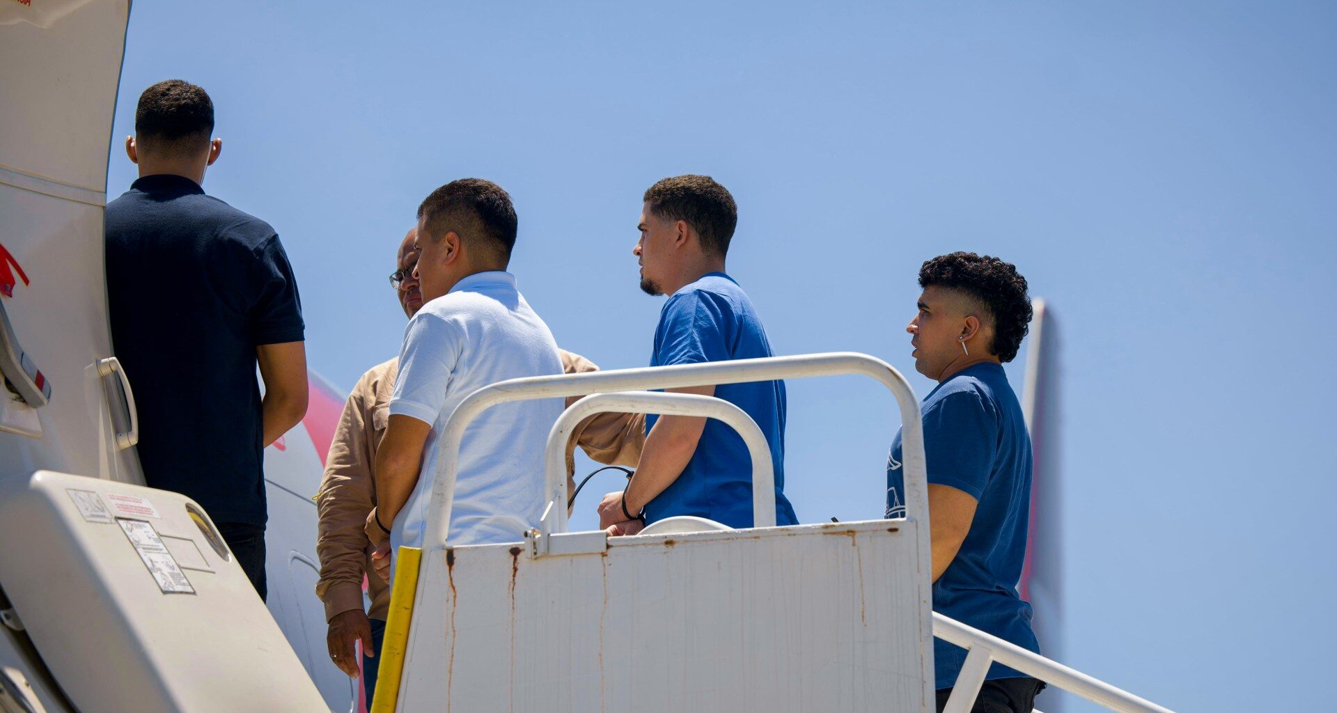 First group of US deportees, out of an expected 1,200, arrive in Liberia | Donald Trump News