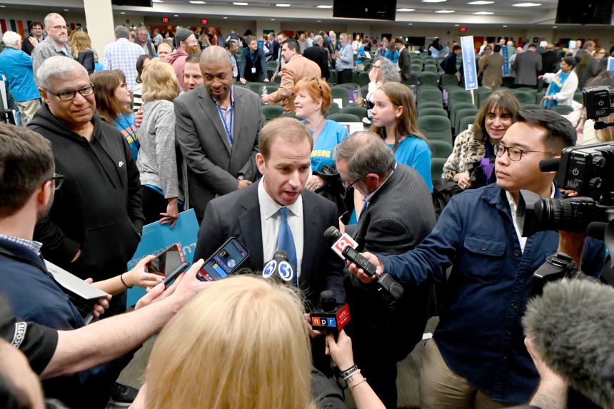 Former Hartford Mayor Luke Bronin talks to reporters after winning the First Congressional District Democratic convention, on May 11, 2026, at Goodwin College in East Hartford.
