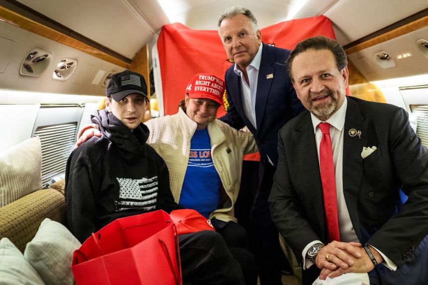 Robert Gilman and his mother pictured with Special Envoy Steve Witkoff (center right) after the US Marine veteran arrived back in the US following his released from detention in Russia.