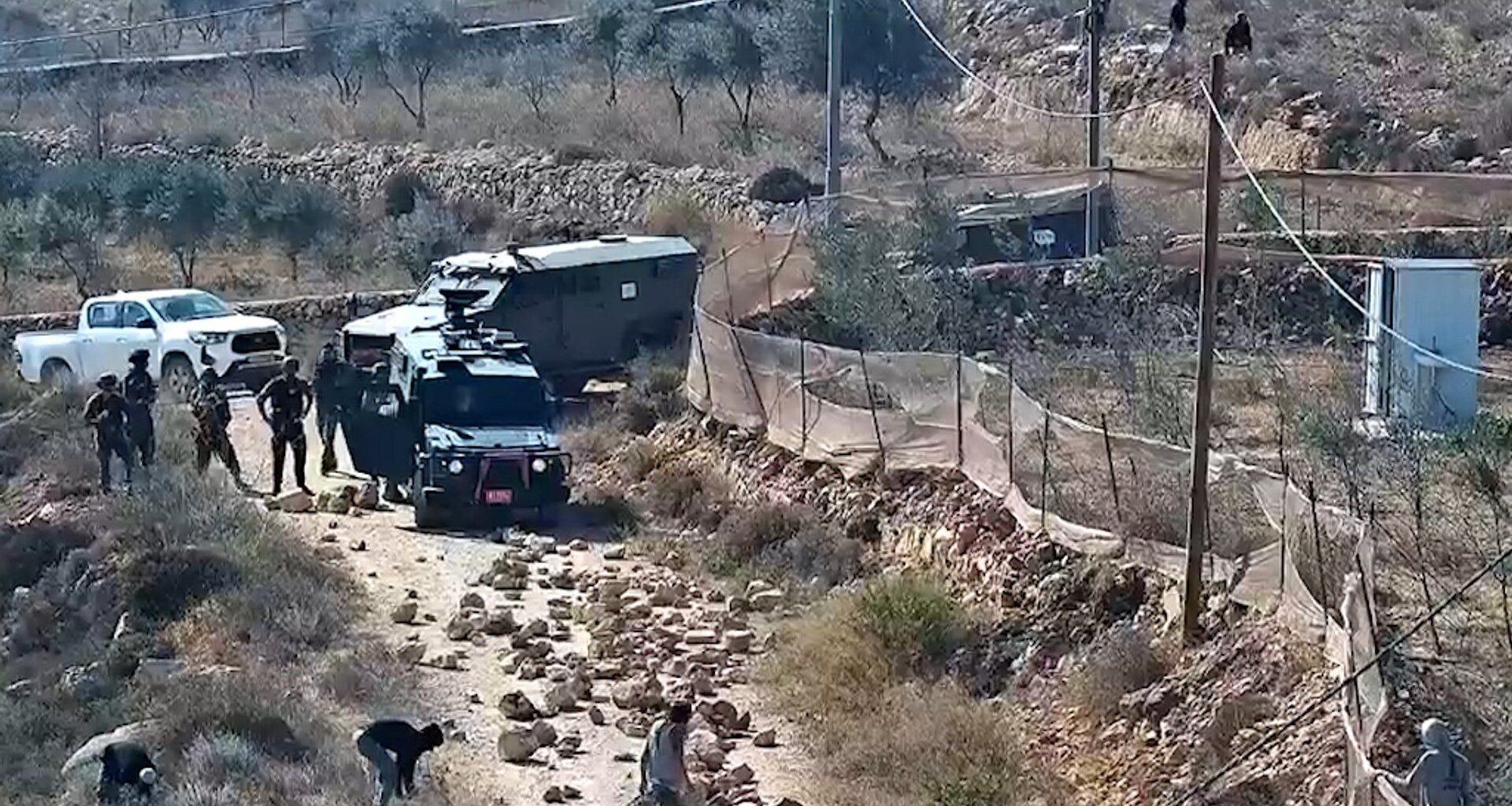 Three Palestinian families besieged in their homes by Israeli settlers | Israel-Palestine conflict News