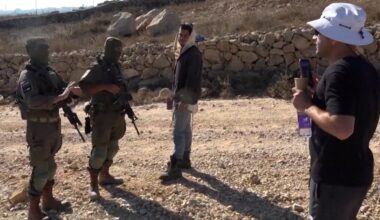 Palestinian-American confronts Israeli settler at his besieged home | Israel-Palestine conflict News