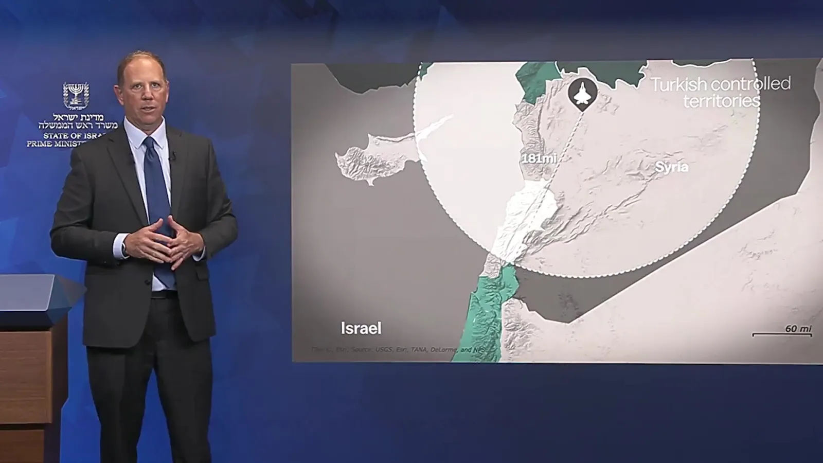 Israeli Prime Minister's Office spokesperson Doron Spielman speaks during a video justifying the strike against Syria's Abu al-Duhur airbase against the backdrop of perceived threats from Turkey on August 21, 2026.